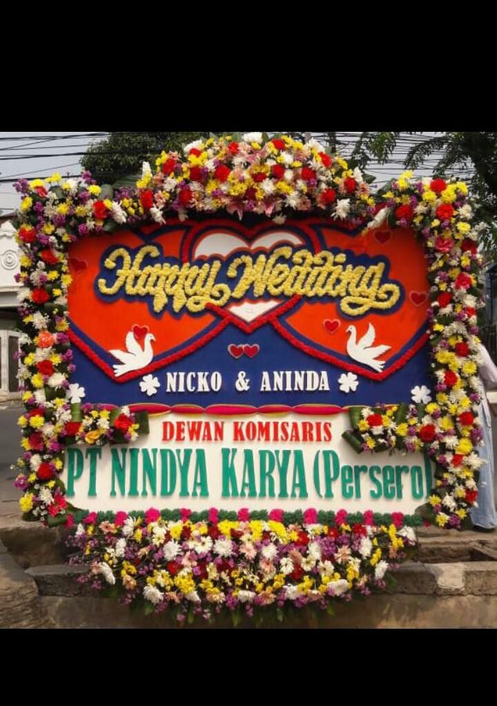 Karangan bunga papan happy wedding
